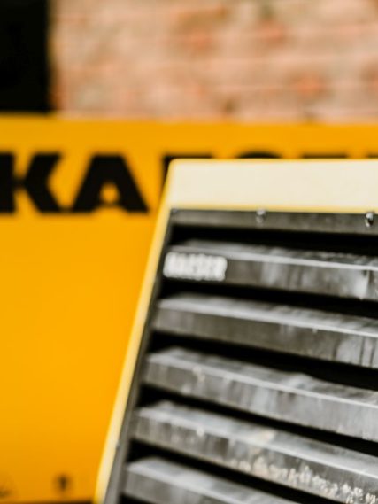 Gelber Käser mobiler Kompressor