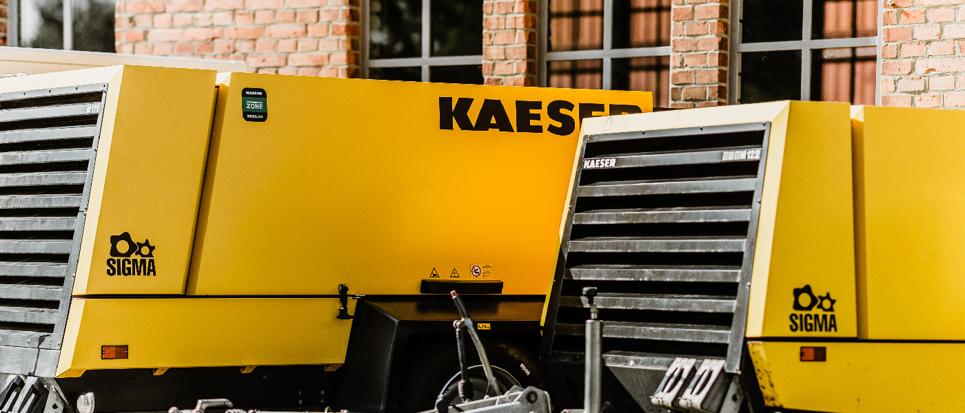 Zwei gelbe Käser Kompressoren